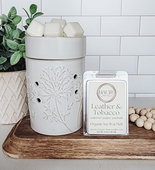 Haute Candles Leather & Tobacco soy wax melts in an electric fragrance warmer 