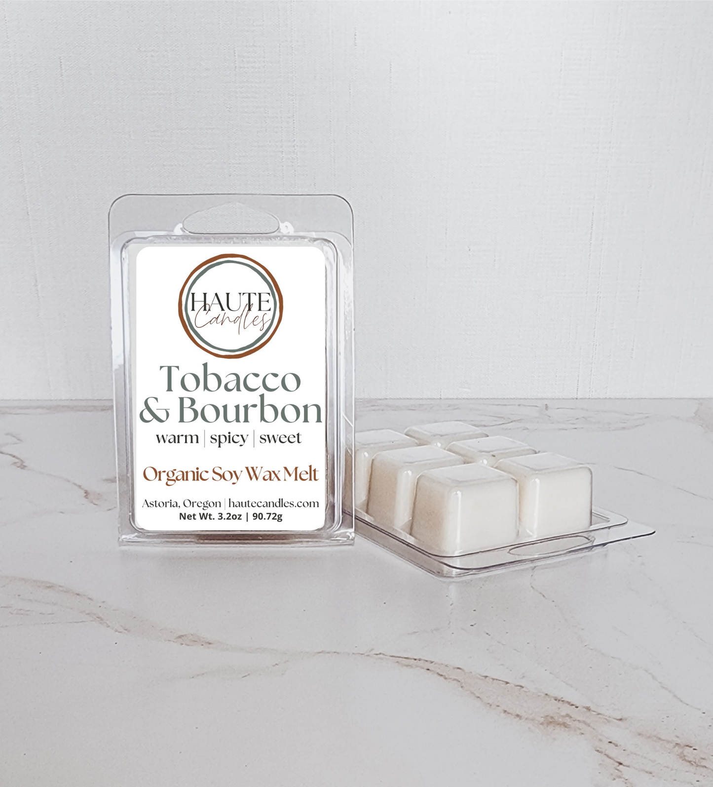 Haute Candles soy wax melts in six-piece clamshell packaging with Tobacco & Bourbon